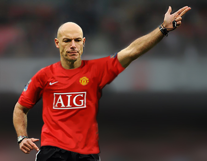 Howard Webb in a Manchester United Shirt